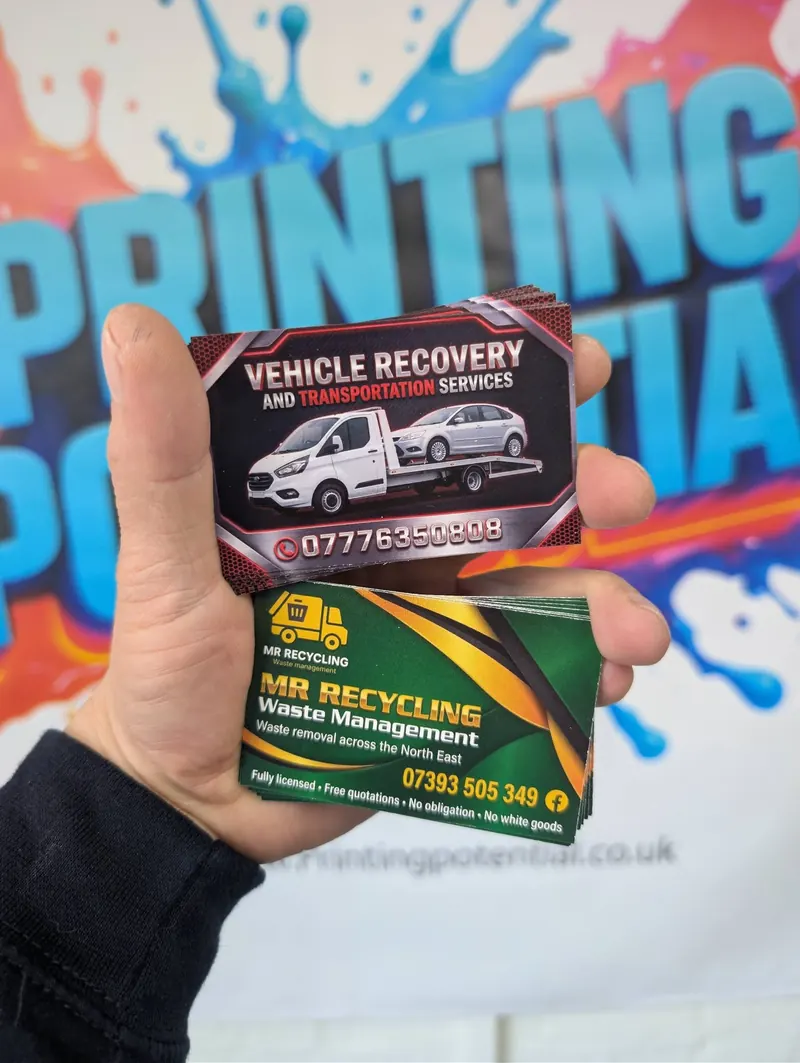 Business cards for a vehicle recovery firm and MR Recycling
