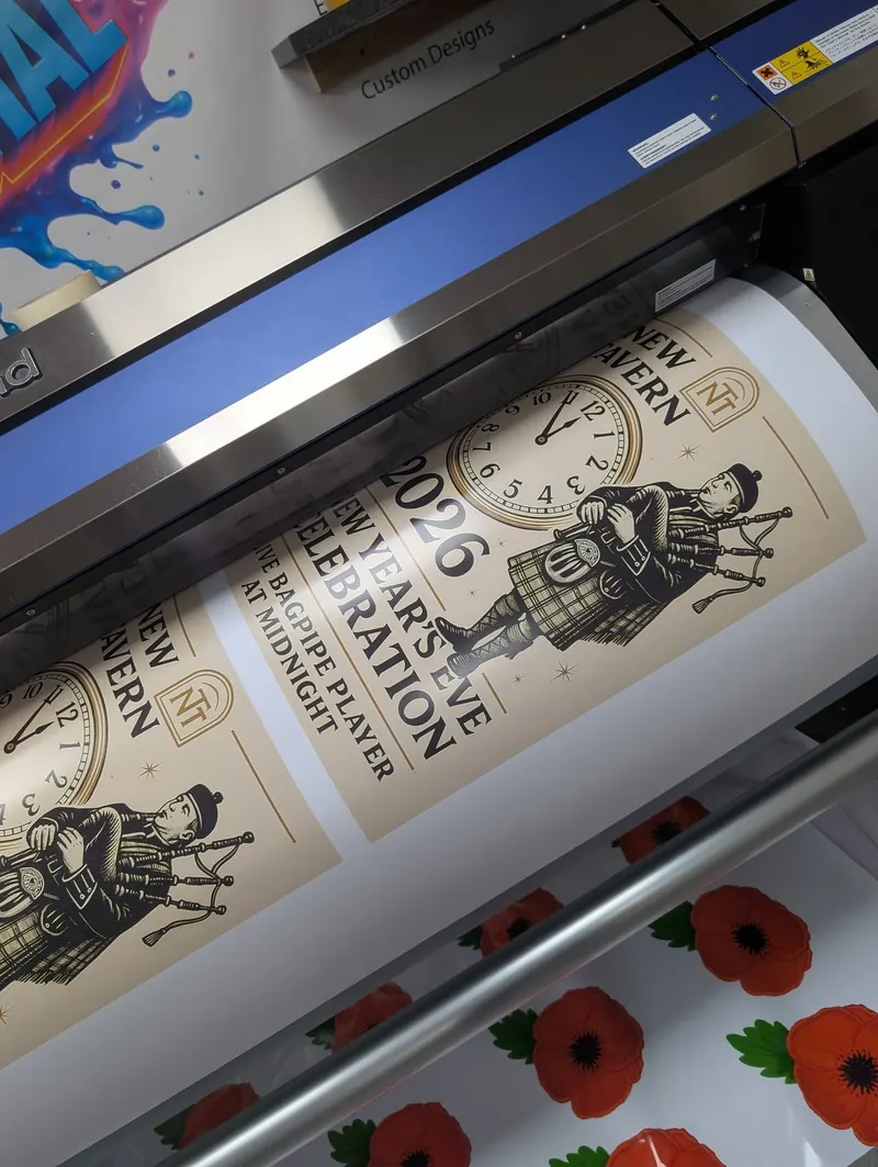 New Year's Eve event poster coming off the printer