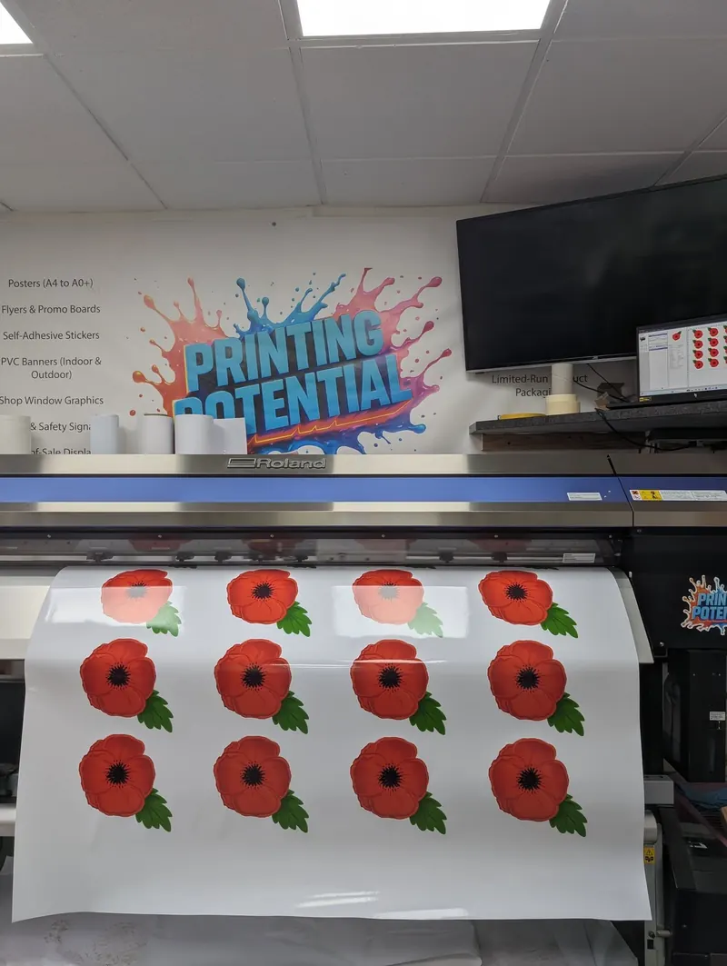 Printed poppy stickers on the printer
